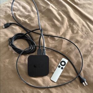 Apple TV HD Streaming Player in Black with White Siri Remote